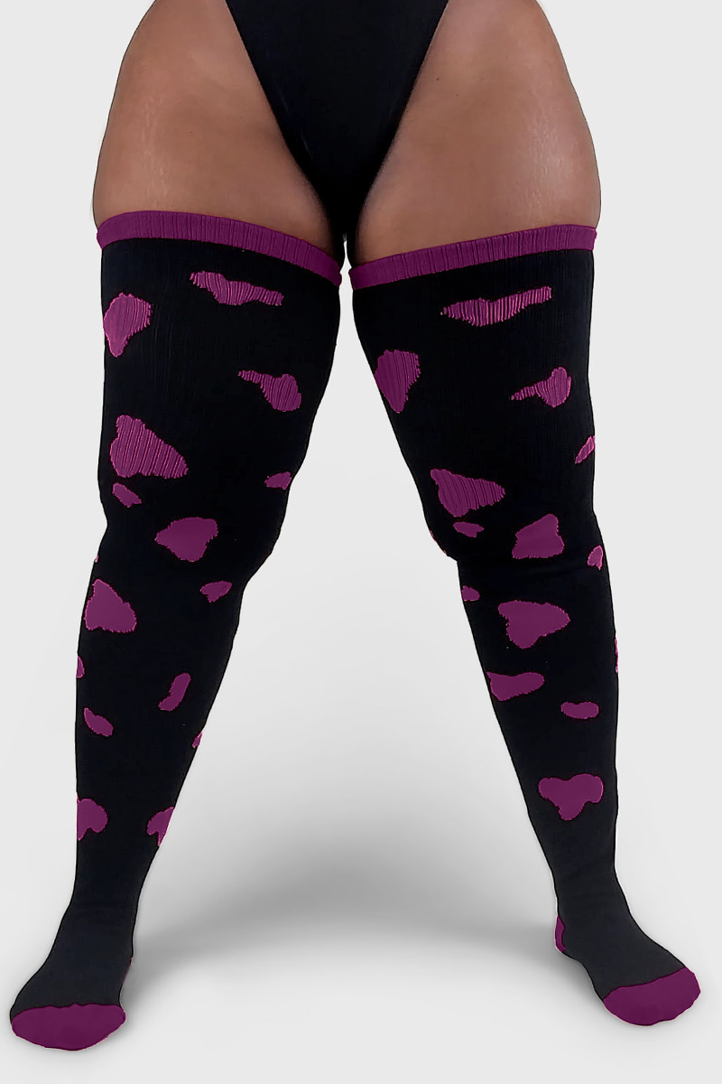 THUNDA THIGHS Tūbbies - Cow Print (Black w/Purple Spots)